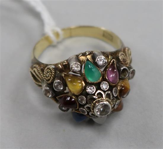 An Indian 18k gold and multi gem set ring, size N.